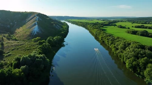 Aerial Video Footage of an Inflatable Boat Floating on the River