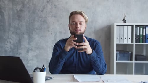 Business persons is work alone in modern office using computer technology.