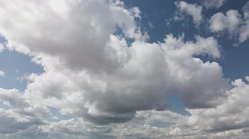 White clouds on blue background