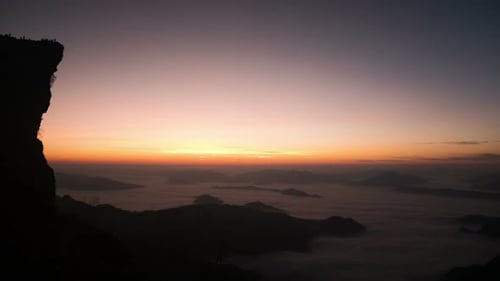 Scenic Mountain Landscape at Sunrise with Fog