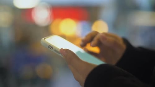 Young Woman Scrolling Smartphone Chatting With Friends in Messenger Technologies