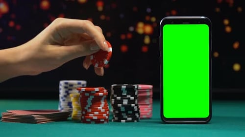 Casino Tokens and Cards Lying Near Green Screen Smartphone, Online Gambling
