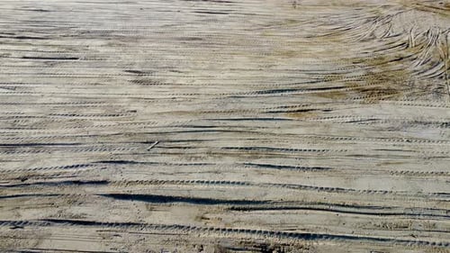Aerial view yellow soil of trace excavator and tractor