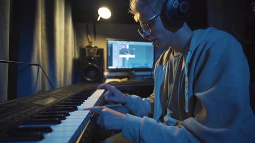 Teenager at Home Composes Music In His Home Sound Studio