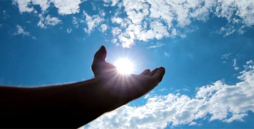 Hand Reaching for the Sky and Sun
