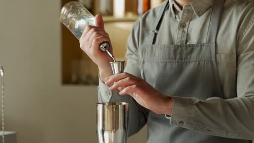 Bartender Prepares Cocktail Drink with Precision