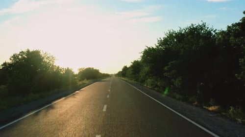 Fast Flight Over the Asphalt Road