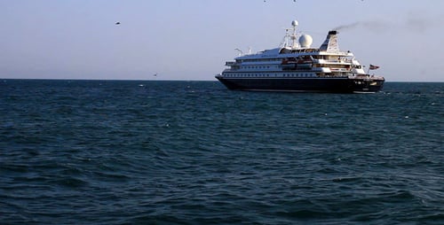 Cruise Ship Sailing on the Ocean on Bright Day
