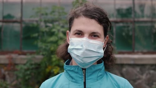 Adult Woman Wearing Mask Outdoors