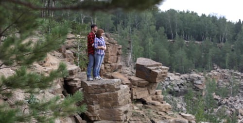 Couple On Cliff