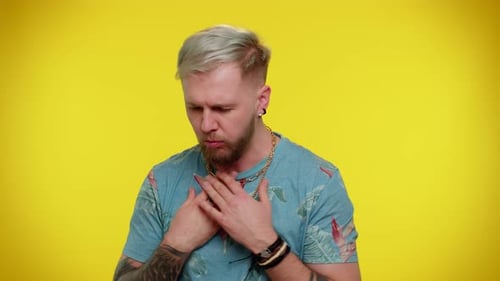 Man Clutching Throat in Distress