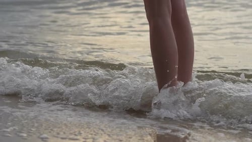 Sea Waves Splashing Leg Women Stand At Beach