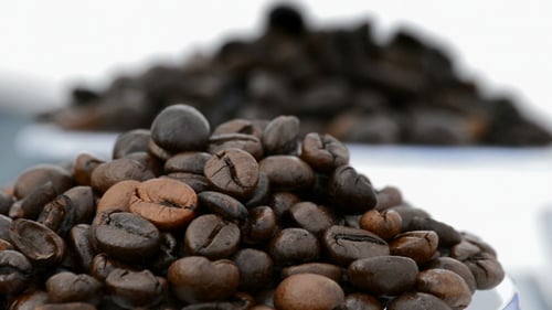 Close Up of Roasted Coffee Beans Panning