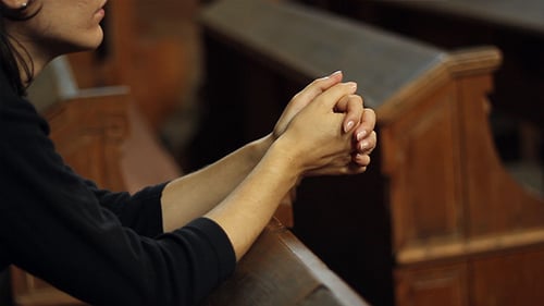 Girl Praying in Church