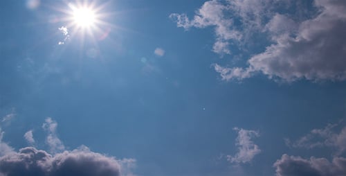 Clouds Flowing Serenely Across Blue Sky Time-lapse