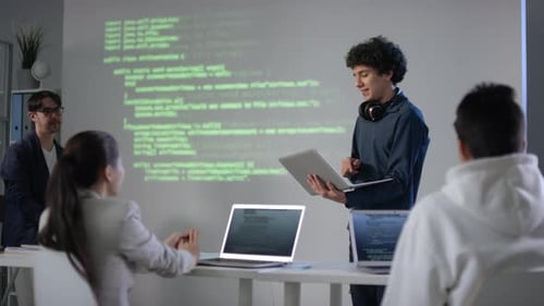 IT Student Answering At Blackboard With Laptop