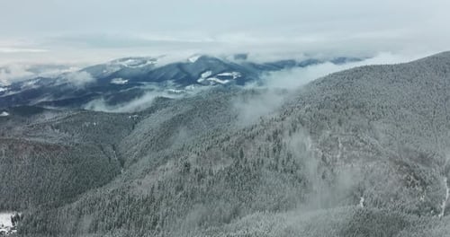 Aerial View. Scenic Mountain Landscape on a Winter Day, Fog in the Low Areas