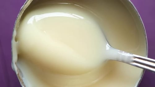 Condensed Milk in a Bowl Close Up