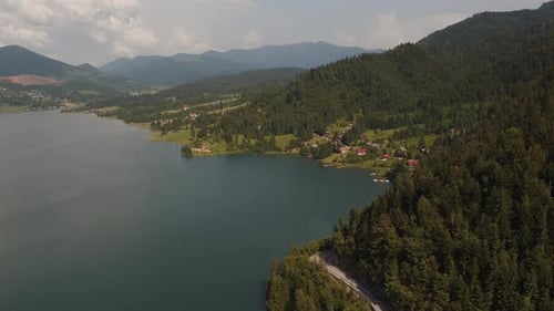 Aerial view of a lake between hills