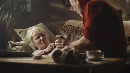 Senior Woman Being Cared for Indoors