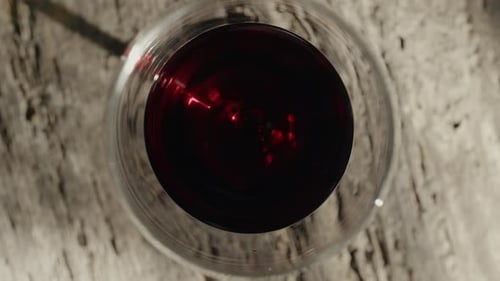 Glass of Red Wine on Stone Surface