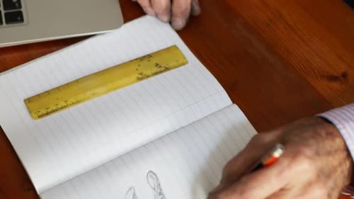 Goldsmith making design in book