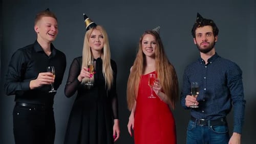 Friends Toasting Champagne at a Party