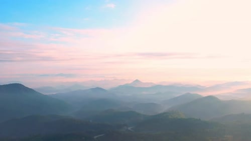 4K Aerial view of Mountains landscape with morning fog.