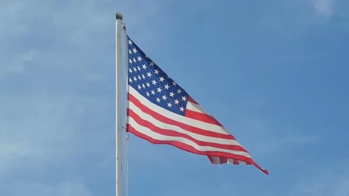 American Flag Waving Proudly in the Wind