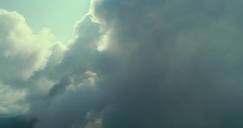 Aerial View of Puffy White Clouds in Sunlight