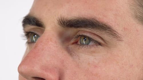 Green Eyes of a Man Looking Away Dreamily and Smiling 1080p
