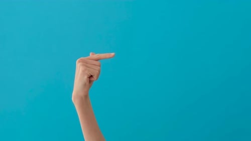 Closeup of a Woman's Hand Pointing to the Right Side
