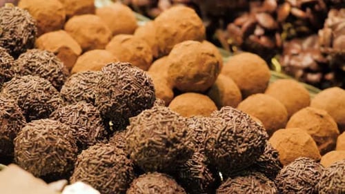Assorted Chocolate Candies in a Pastry Shop Closeup