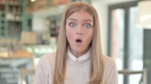 Woman Reacts with Joy and Excitement