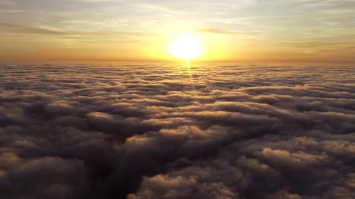 Aerial View of Golden Clouds at Sunrise or Sunset
