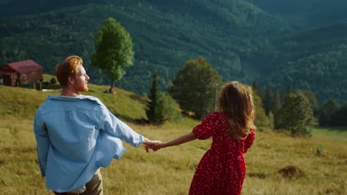 Beautiful Couple Explore Nature on Hill