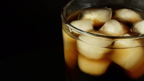 Iced Soda Poured into a Glass Close Up