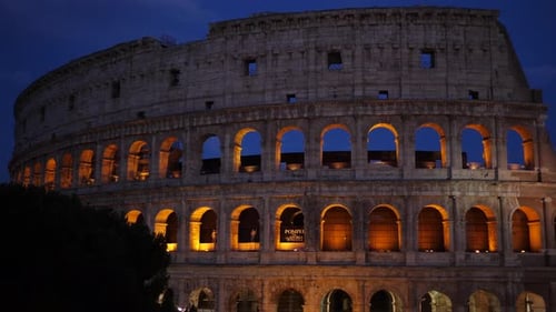 Colosseum amphitheater in Rome at night (Italy)