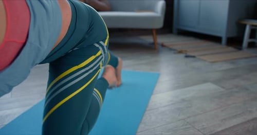 Woman Exercising, Mountain Climbers on Yoga Mat at Home