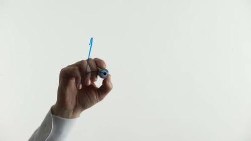 Hand Writes 4G on White Surface