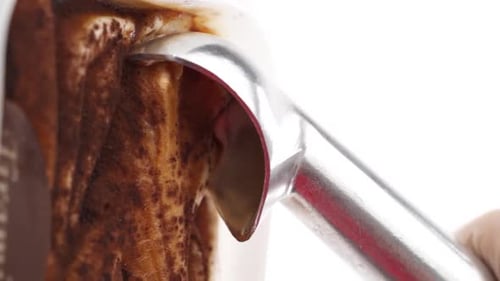 Vertical video: Chocolate ice cream in a glass