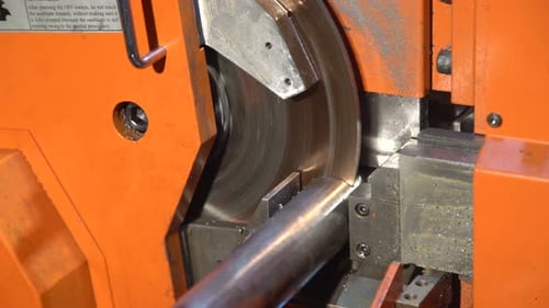 Metal Saw Blade Cuts Metal Pipe