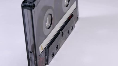 Cassette Tape Spinning in Close Up View
