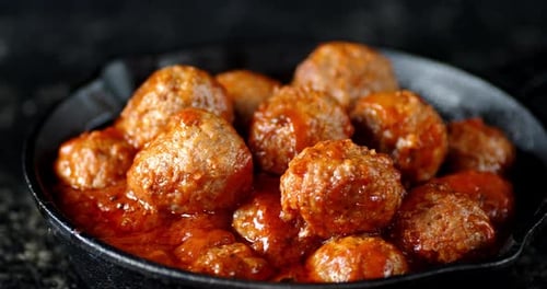 Delicious Meatballs Simmering in Rich Tomato Sauce
