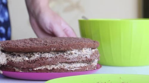 Making Chocolate Layer Cake with Cream Filling