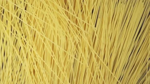 Many Of Spaghetti Fall On A Black Table