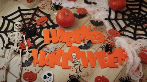 Halloween Still Life with Skeleton and Pumpkins