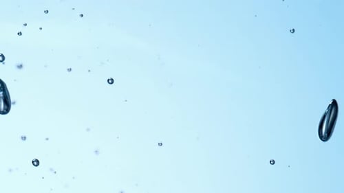 Authentic Natural Underwater Gas Bubble Loop Backgound in Vertical Macro Closeup