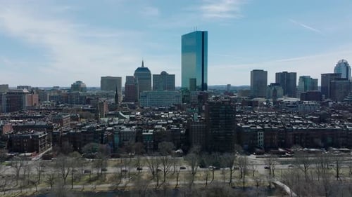 Fly Over Busy Trunk Road on Waterfront and Buildings in Residential Borough