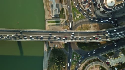 Aerial Top Down View From Drone of Traffic Bridge City with Driving Car